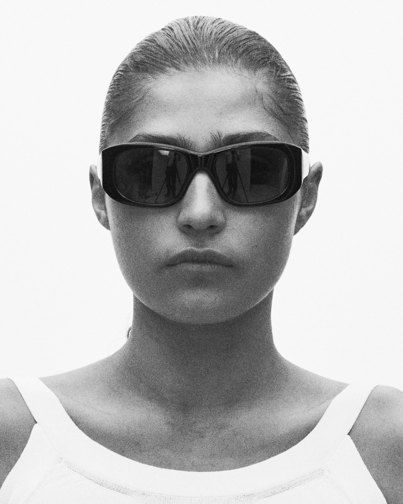 model wearing sunglasses, portrait view