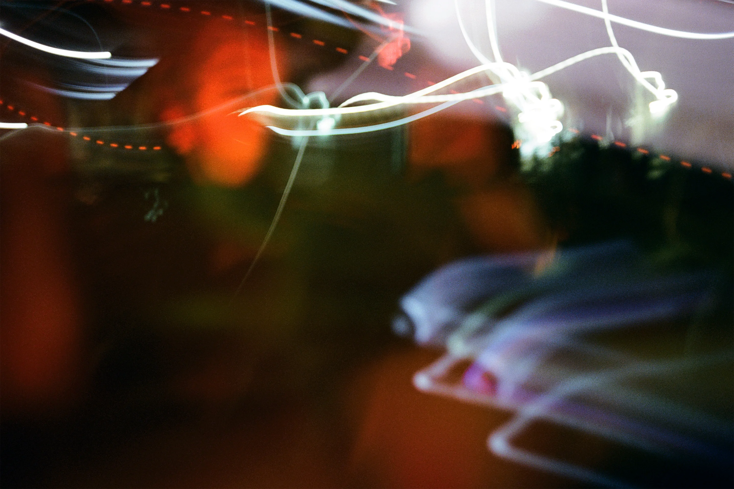 a blur of motion where separate streams of light are visible